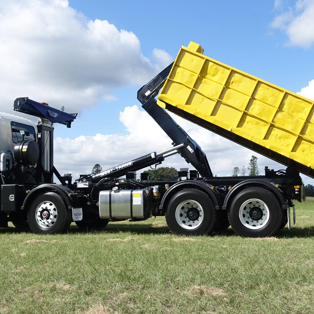 TD0266-WT-RETOUCHING9 yellow skip bin attached to skip loader