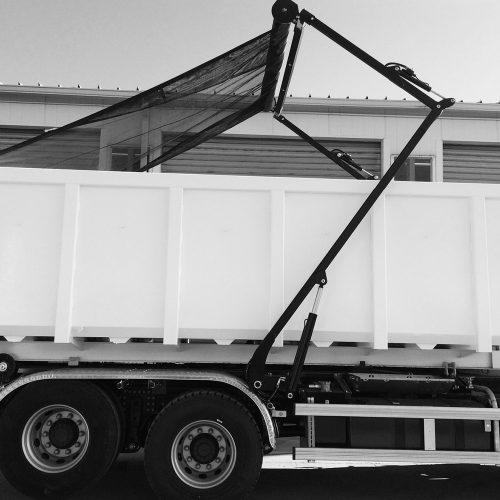 Truck tarp being attached